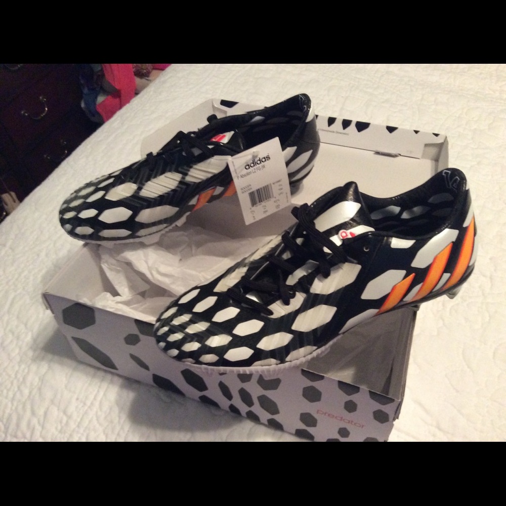 NWT and box Women’s Adidas soccer cleats size 8.